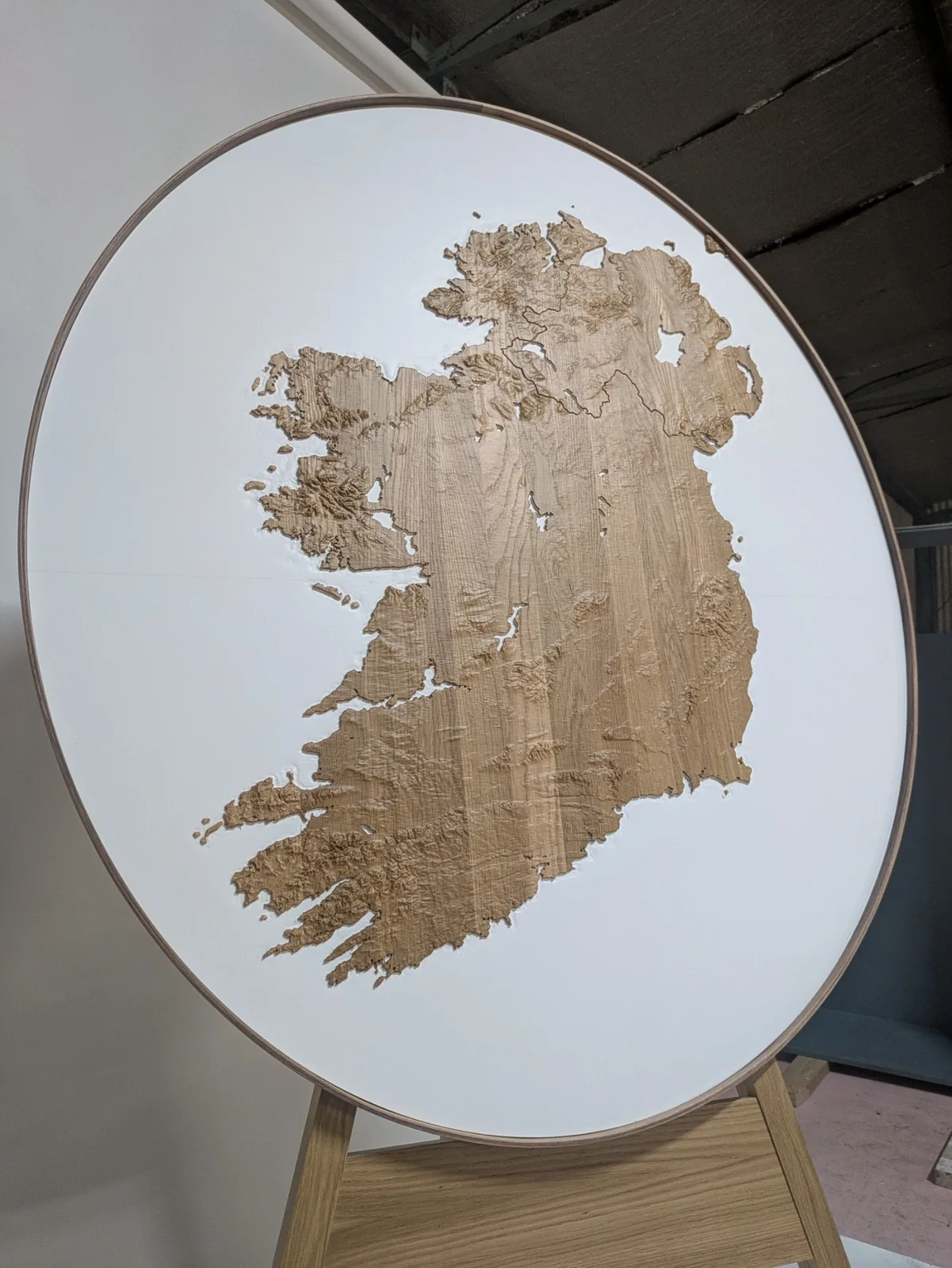 Angled view of the elliptical Ireland model and its curved frame